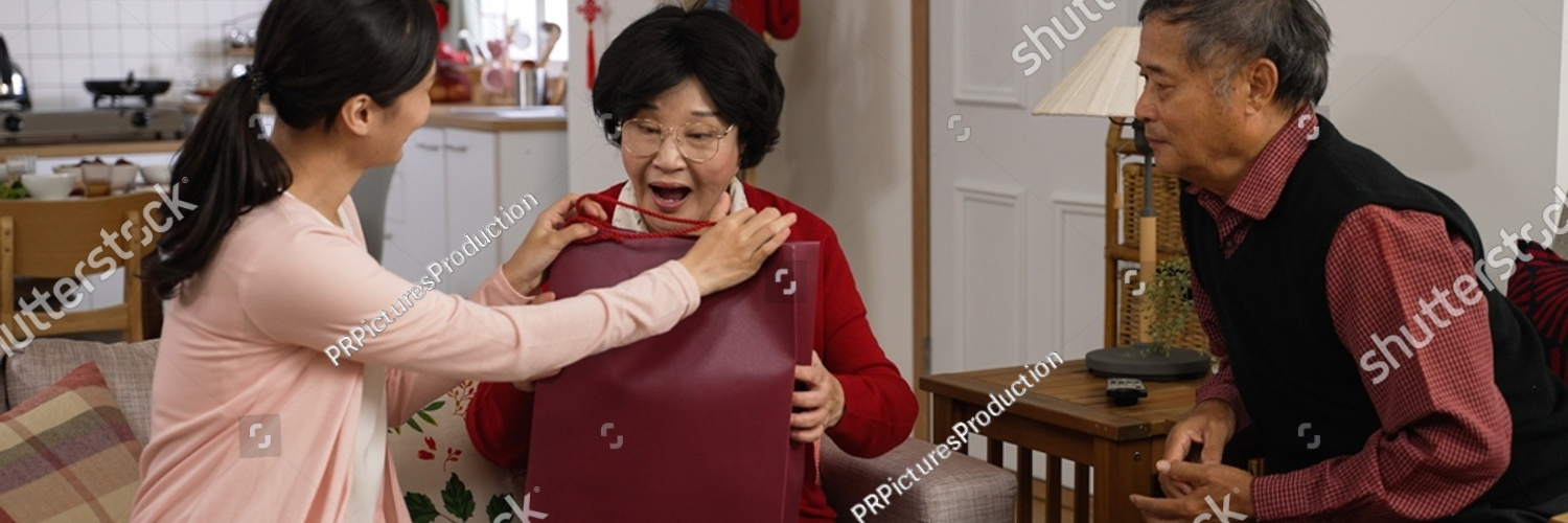 stock photo caring asian adult daughter going back to her mother s house during spring festival chinese new 2095389079