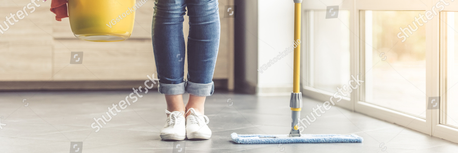 stock photo cropped image of beautiful woman in protective gloves holding a flat wet mop and bucket with 510917605