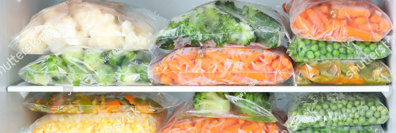 stock photo plastic bags with deep frozen vegetables in refrigerator 1108564076