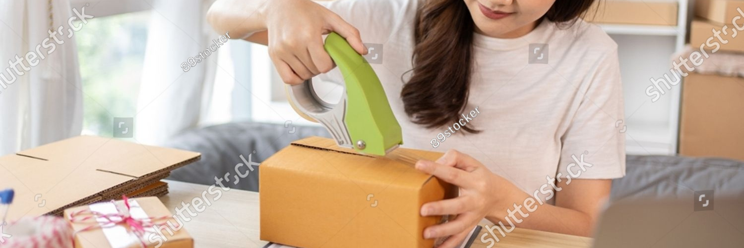stock photo sell online woman packing items into post box for customer shipping online shopping and small 2328350751