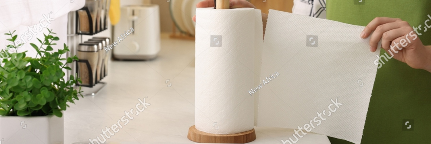 stock photo woman using paper towels in kitchen closeup 2267764745